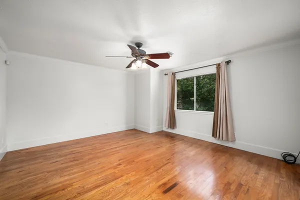 a view of an empty room with a window