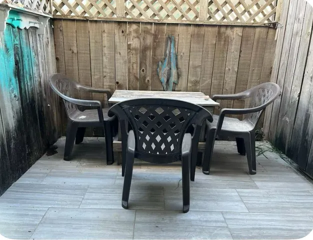 a view of a back yard from a corridor