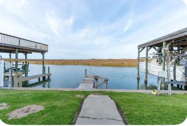a view of swimming pool with outdoor seating