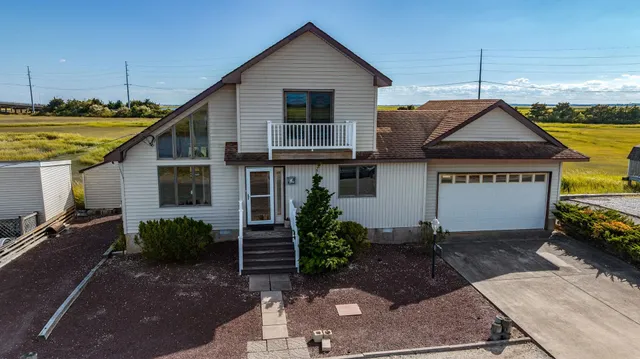 a house view with a garden space
