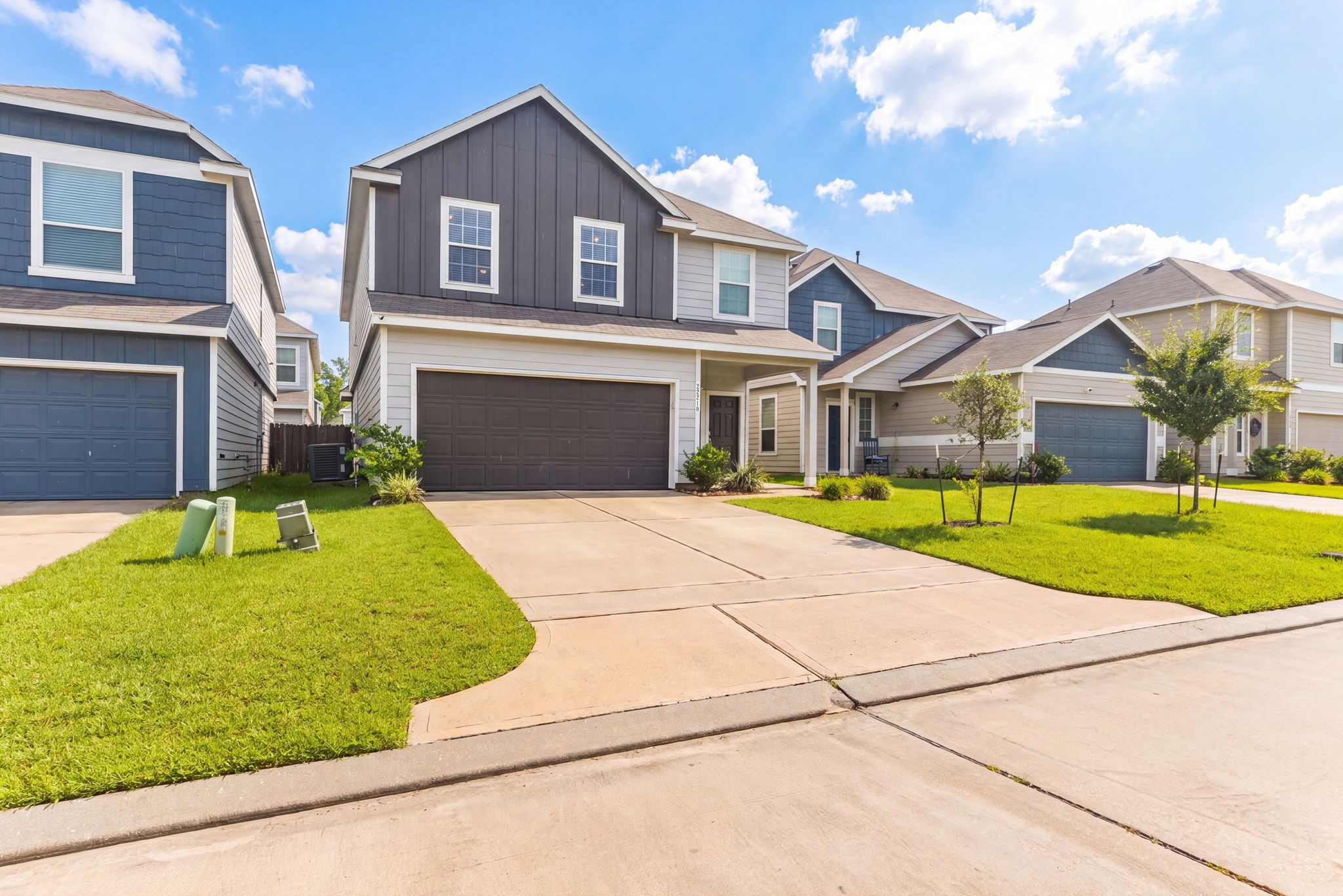 22210 Imperious Parkway Houston, TX 77073 - Photo 3 of 23 a front view of a house with a yard