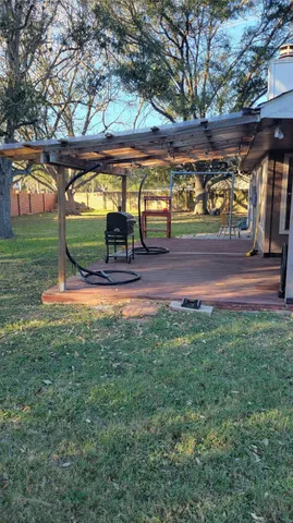 a view of a yard with an outdoor space