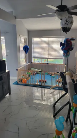 a view of a living room and a couch