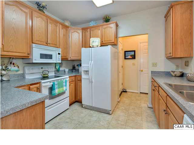 10 North Ridge Way Stanardsville, VA 22973 - Photo 11 of 25 Impress your family/friends/guests with your culinary skills and prowess in this nicely sized kitchen - affording multiple work/counter spaces.