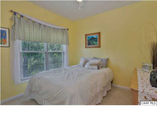 10 North Ridge Way Stanardsville, VA 22973 - Photo 17 of 25 The second of three bedrooms is bright and cherry.