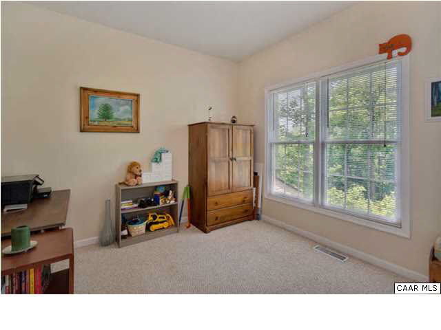 10 North Ridge Way Stanardsville, VA 22973 - Photo 18 of 25 The third bedroom with yet another large window to allow in natural light - a reoccurring theme throughout the home.