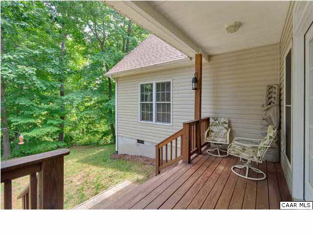 10 North Ridge Way Stanardsville, VA 22973 - Photo 21 of 25 Enjoy sitting on your covered back porch while you are ensconced in nature.