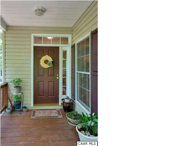 10 North Ridge Way Stanardsville, VA 22973 - Photo 5 of 25 Stylish transoms around the entrance door and a large window looking into the living room provides lots of natural light.