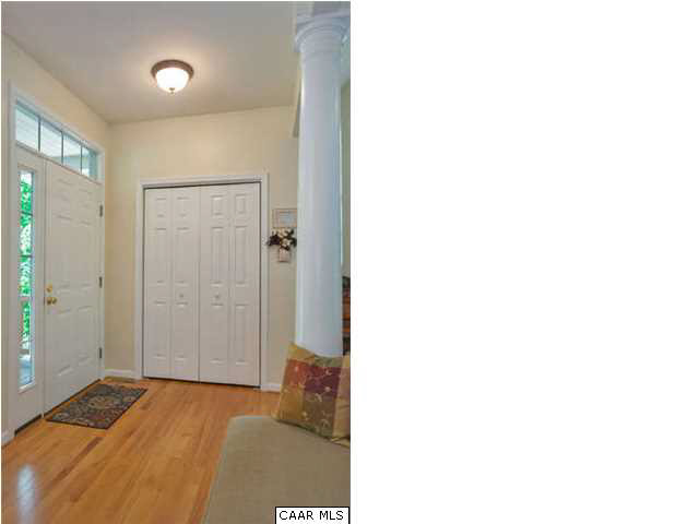 10 North Ridge Way Stanardsville, VA 22973 - Photo 6 of 25 Light filled entry way/foyer and a generously sized coat closet is conveniently located for storing all your coats and other sundries within easy reach.