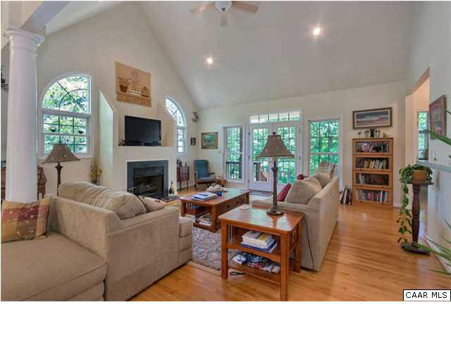 10 North Ridge Way Stanardsville, VA 22973 - Photo 7 of 25 The entryway opens onto the spacious living/great room with lots of windows and a gorgeous fireplace for entertaining family and friends.