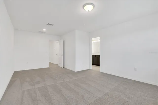 an empty room with an entryway