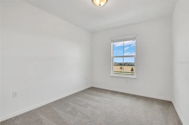 an empty room with a window