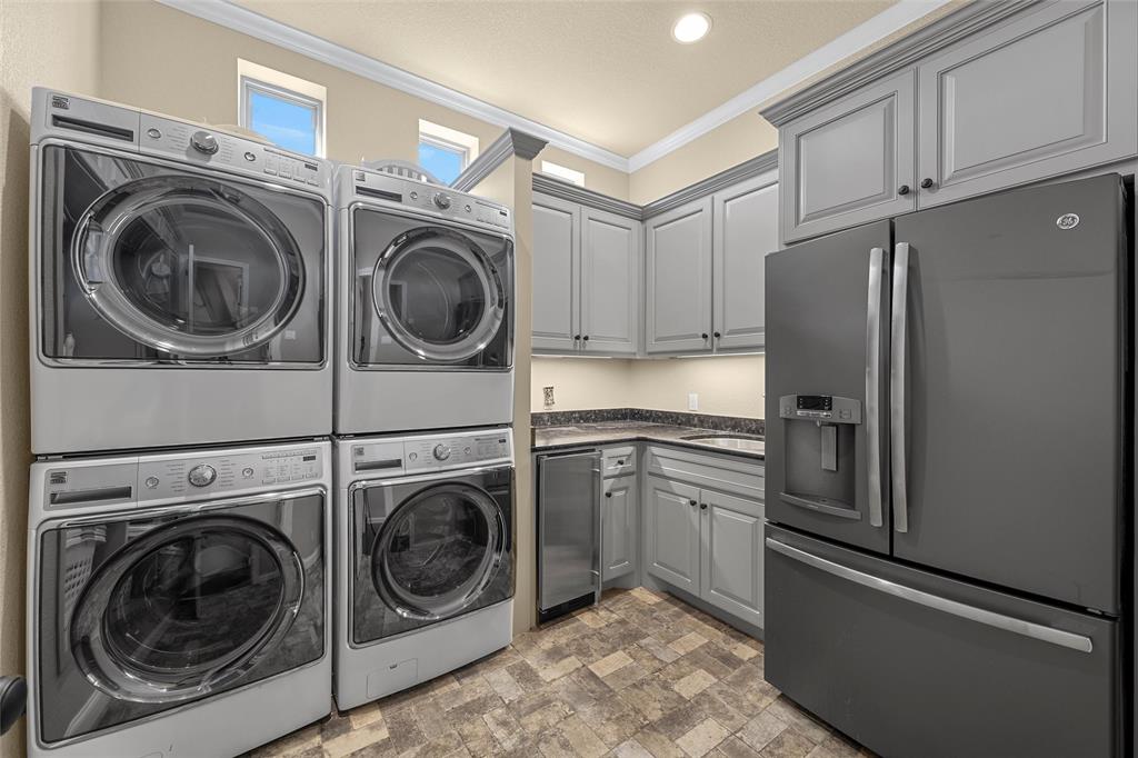 14690 Chapel Road Lorena, TX 76655 - Photo 16 of 40 a utility room with sink dryer and washer