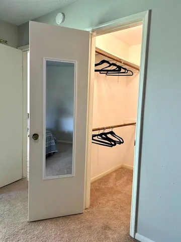 a view of a bathroom from a hallway