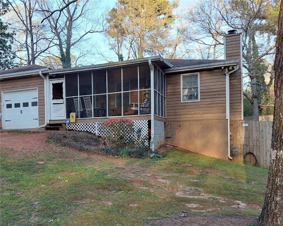 4657 Ridge Drive Winston, GA 30187 - Photo 1 of 1 a front view of a house with garden