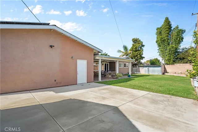 a porch with seating space and a garage