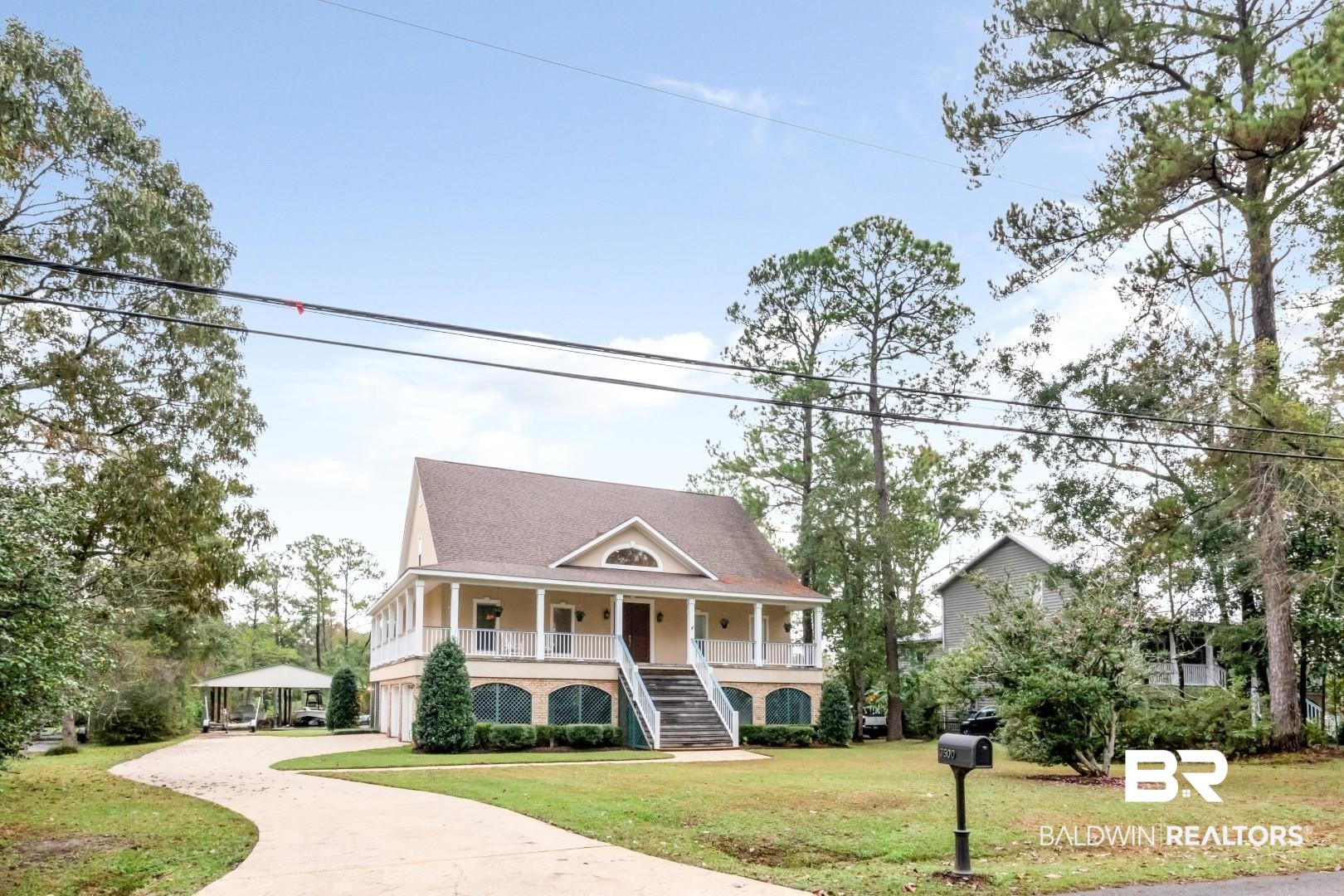 3500 North Riviere Du Chien Loop Mobile, AL 36693 - Photo 67 of 74 View of front of property featuring covered porch and a front yard