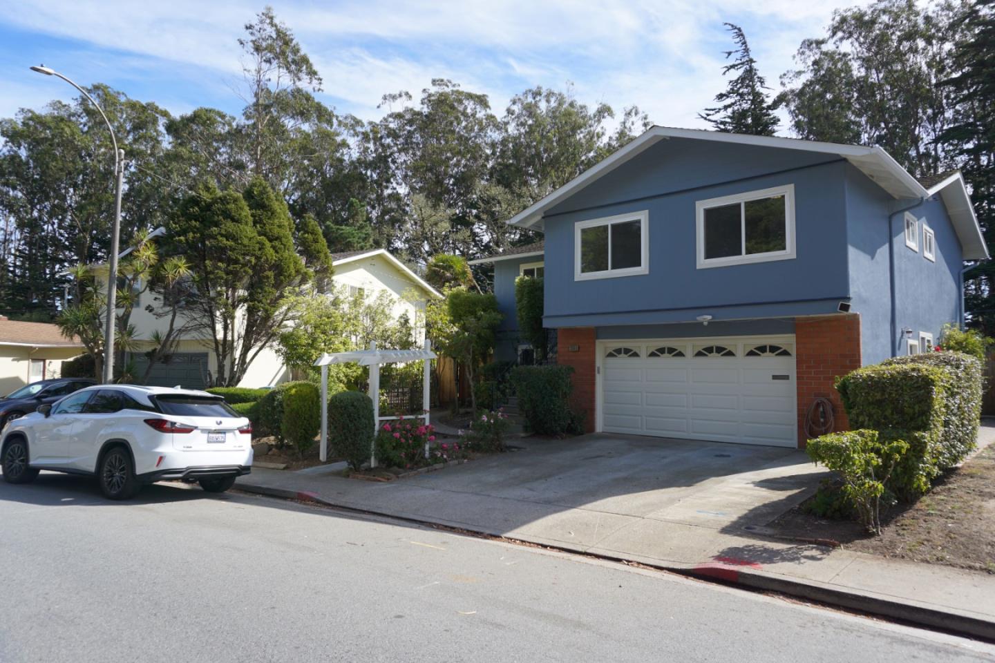 3090 Longview Drive San Bruno, CA 94066 - Photo 2 of 23 a view of a car parked in front of a house