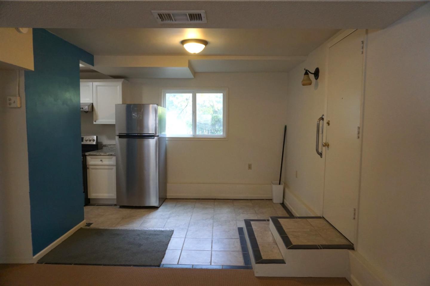 3090 Longview Drive San Bruno, CA 94066 - Photo 21 of 23 a view of a refrigerator in kitchen and an empty room