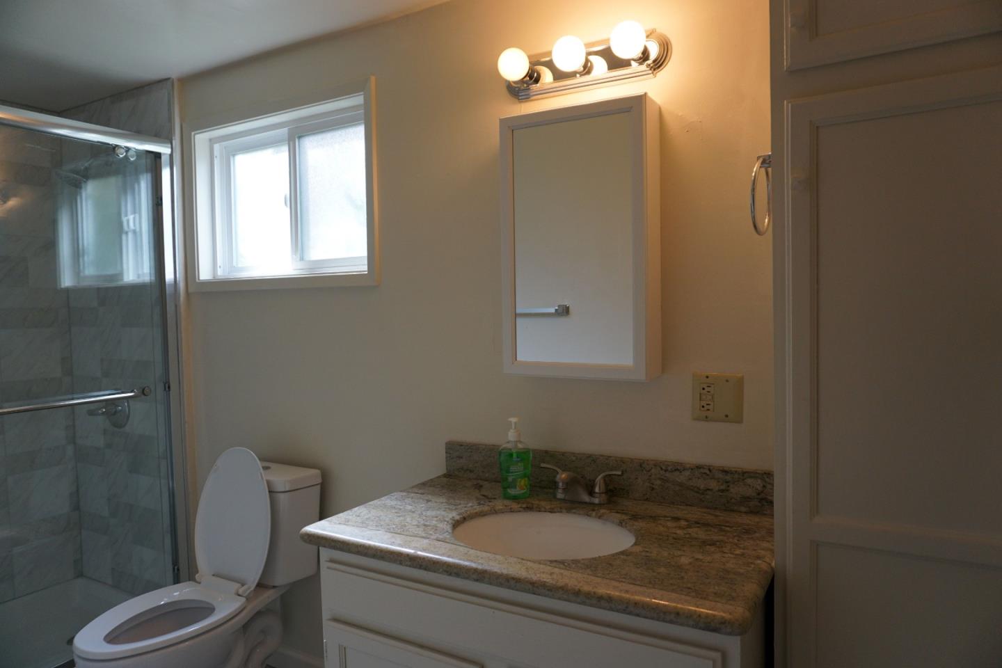 3090 Longview Drive San Bruno, CA 94066 - Photo 23 of 23 a bathroom with a sink toilet and shower