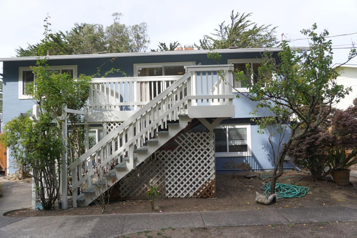 3090 Longview Drive San Bruno, CA 94066 - Photo 4 of 23 a front view of a house with garden