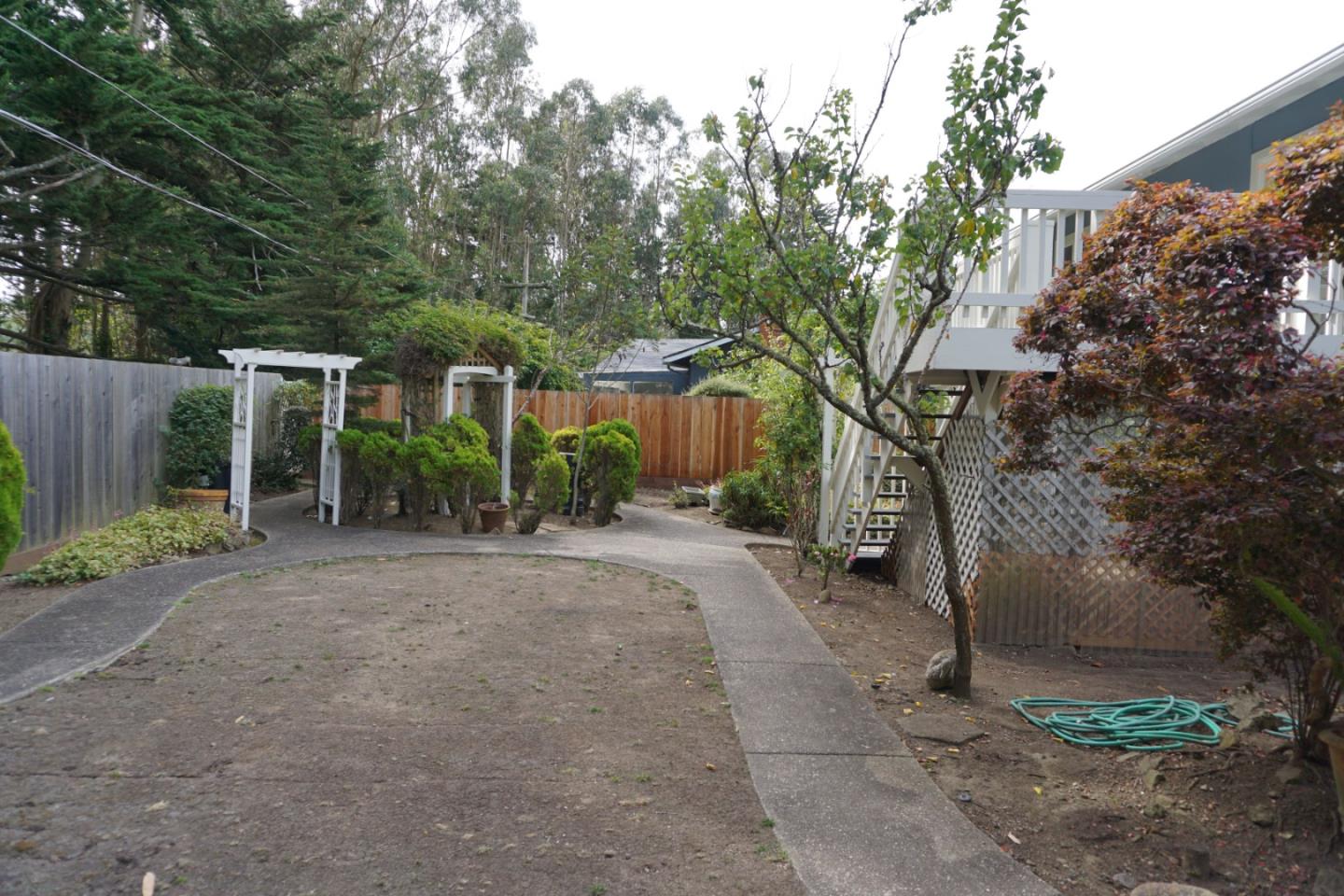 3090 Longview Drive San Bruno, CA 94066 - Photo 5 of 23 a view of a house with a yard and tree s