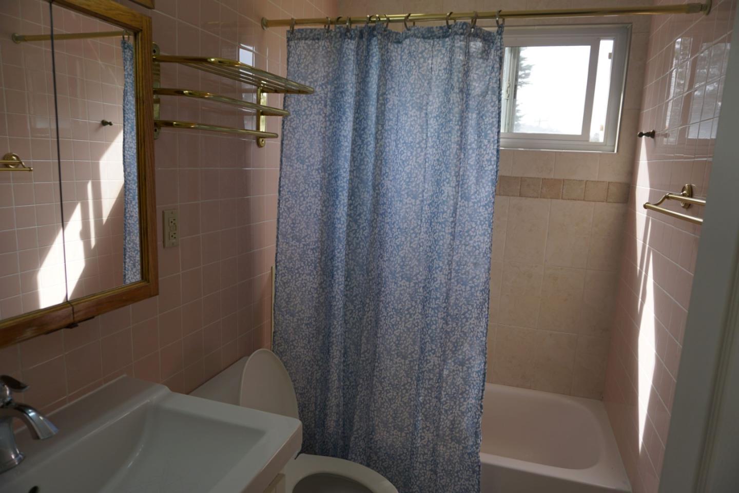 3090 Longview Drive San Bruno, CA 94066 - Photo 10 of 23 a bathroom with a shower and a sink