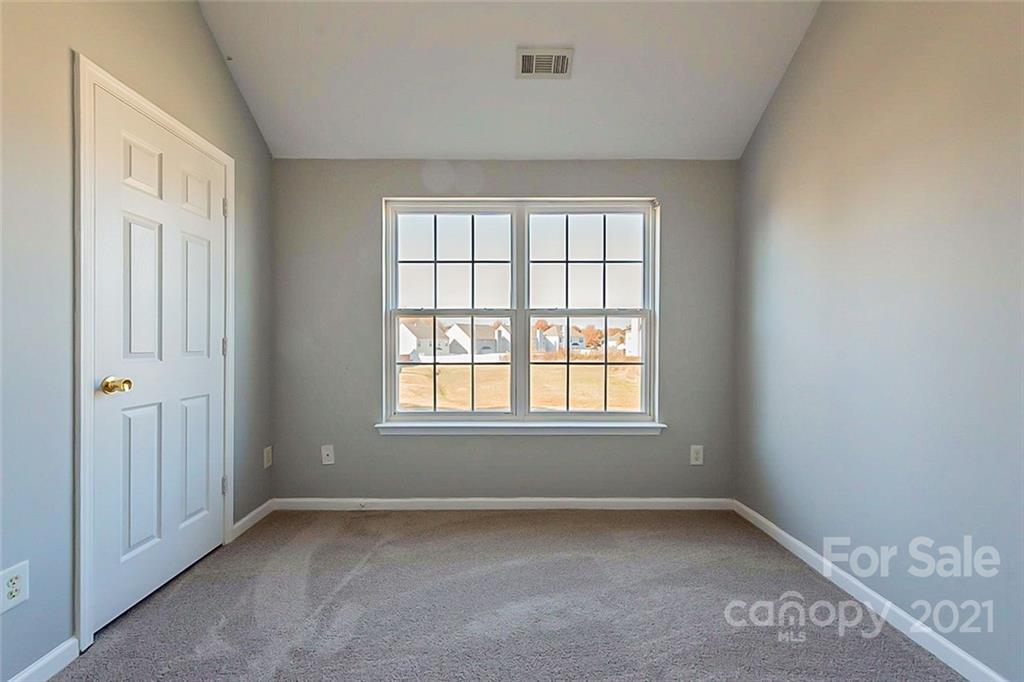 2759 Rustic Ridge Court Rock Hill, SC 29730 - Photo 12 of 19 an empty room with a window