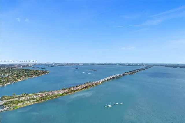 a bedroom with a bed and a walk in closet