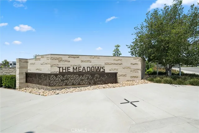 an aerial view of residential building and trees