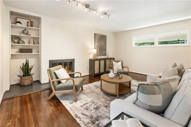 a living room with furniture and a table