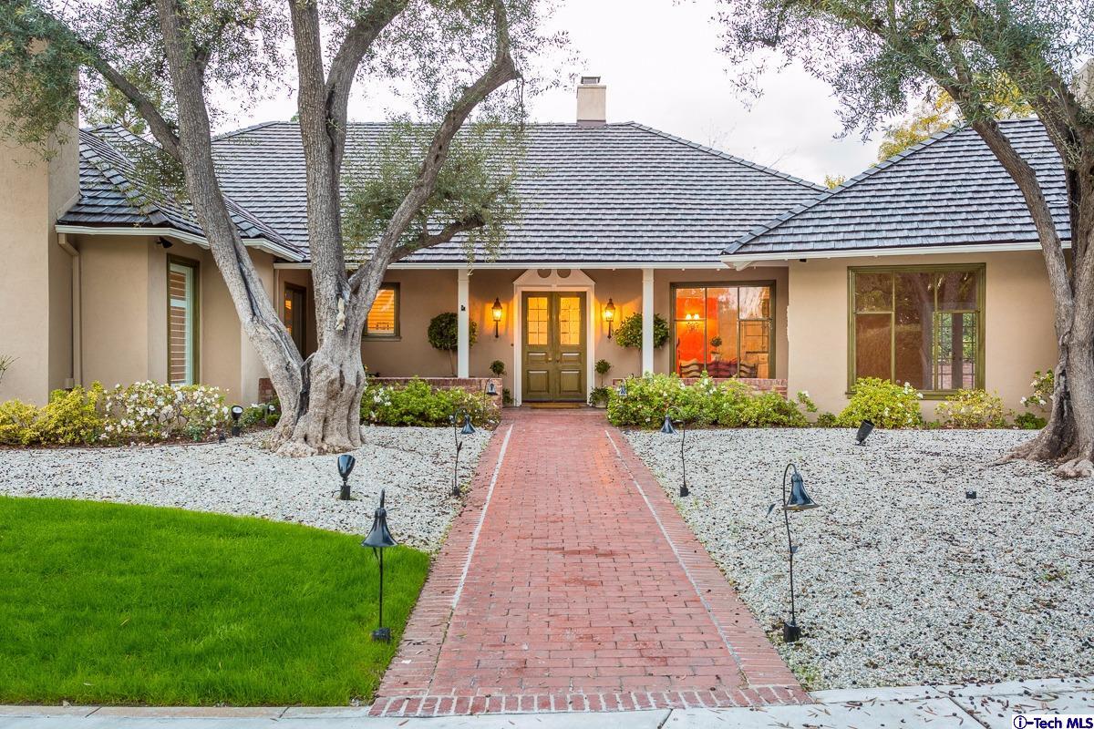 1 Oak Knoll Terrace Pasadena, CA 91106 - Photo 21 of 88 a front view of a house with a garden and plants