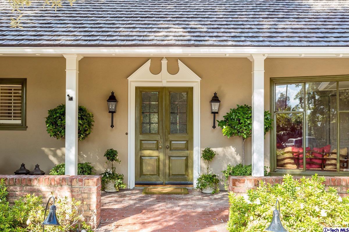 1 Oak Knoll Terrace Pasadena, CA 91106 - Photo 22 of 88 a front view of a building with a garden