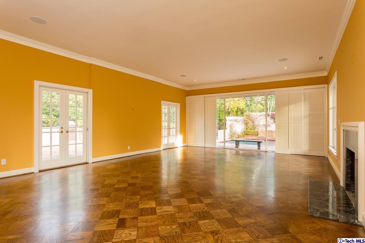 1 Oak Knoll Terrace Pasadena, CA 91106 - Photo 25 of 88 a view of an empty room with wooden floor and a window