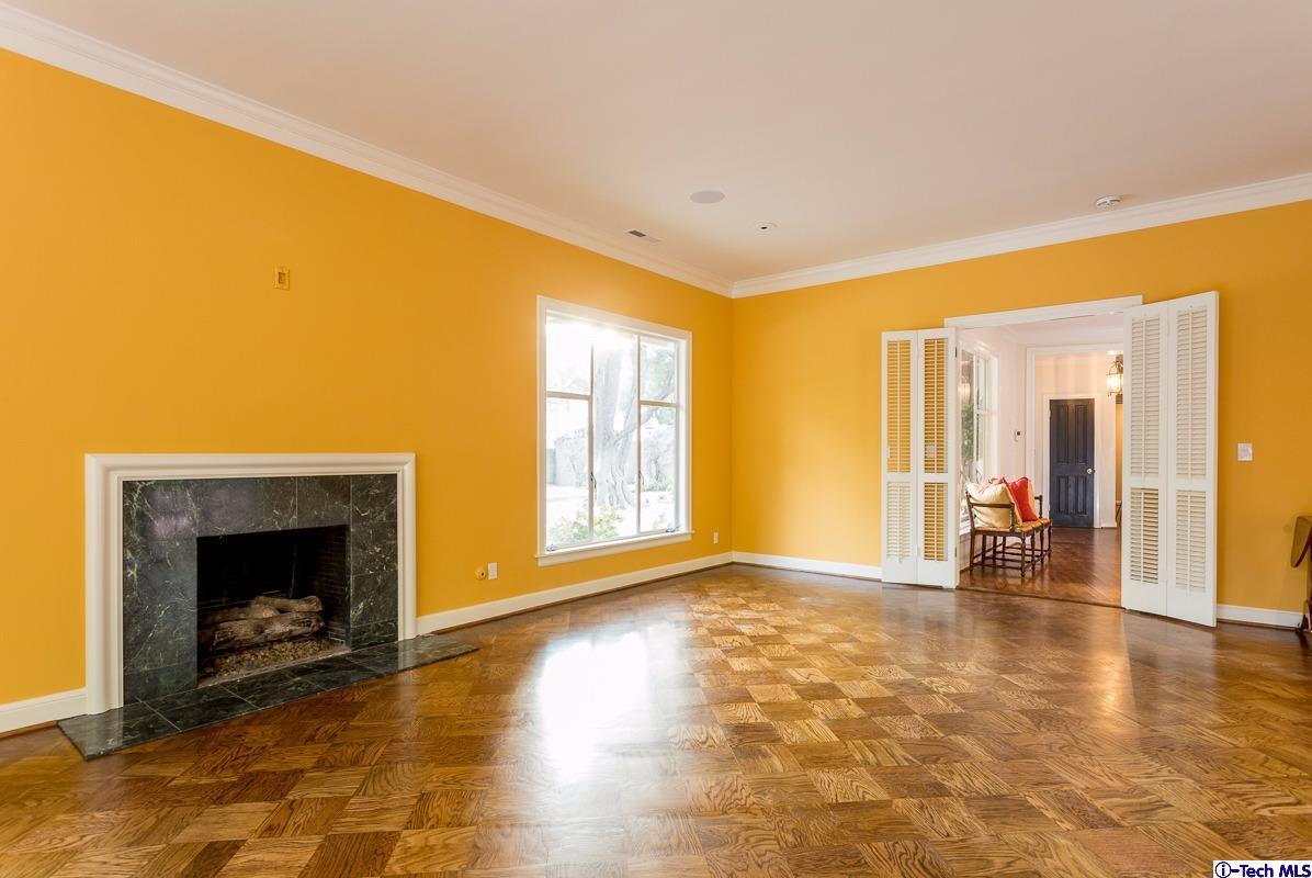 1 Oak Knoll Terrace Pasadena, CA 91106 - Photo 29 of 88 a view of empty room with fireplace and wooden floor
