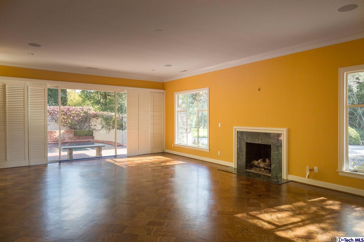 1 Oak Knoll Terrace Pasadena, CA 91106 - Photo 30 of 88 a view of an empty room with wooden floor and a window