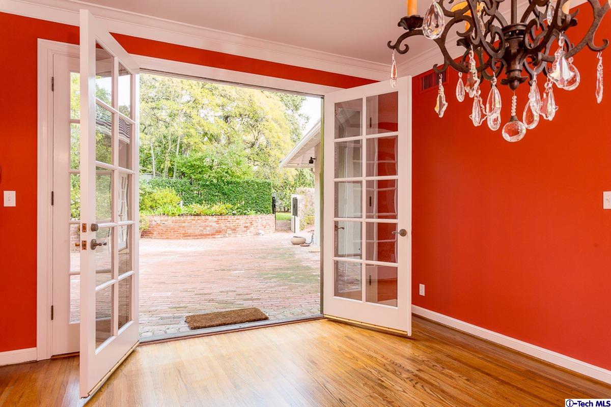 1 Oak Knoll Terrace Pasadena, CA 91106 - Photo 40 of 88 a view of an empty room with wooden floor and a window