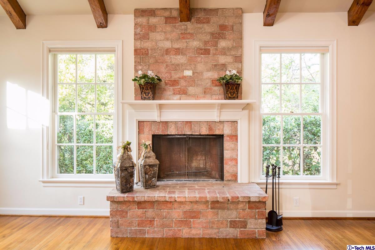 1 Oak Knoll Terrace Pasadena, CA 91106 - Photo 46 of 88 an empty room with fireplace and windows