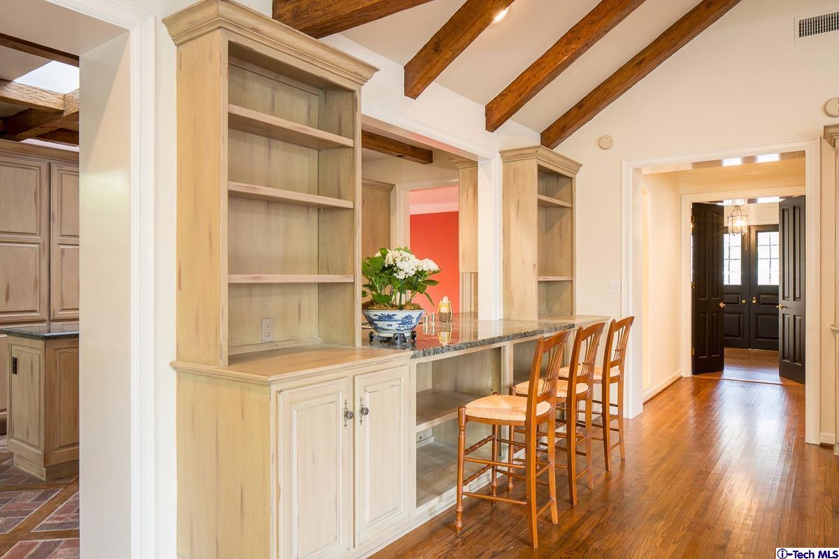 1 Oak Knoll Terrace Pasadena, CA 91106 - Photo 52 of 88 a view of a hallway with wooden floor and windows