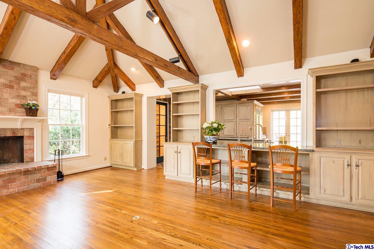 1 Oak Knoll Terrace Pasadena, CA 91106 - Photo 54 of 88 a view of an empty room with wooden floor and a window