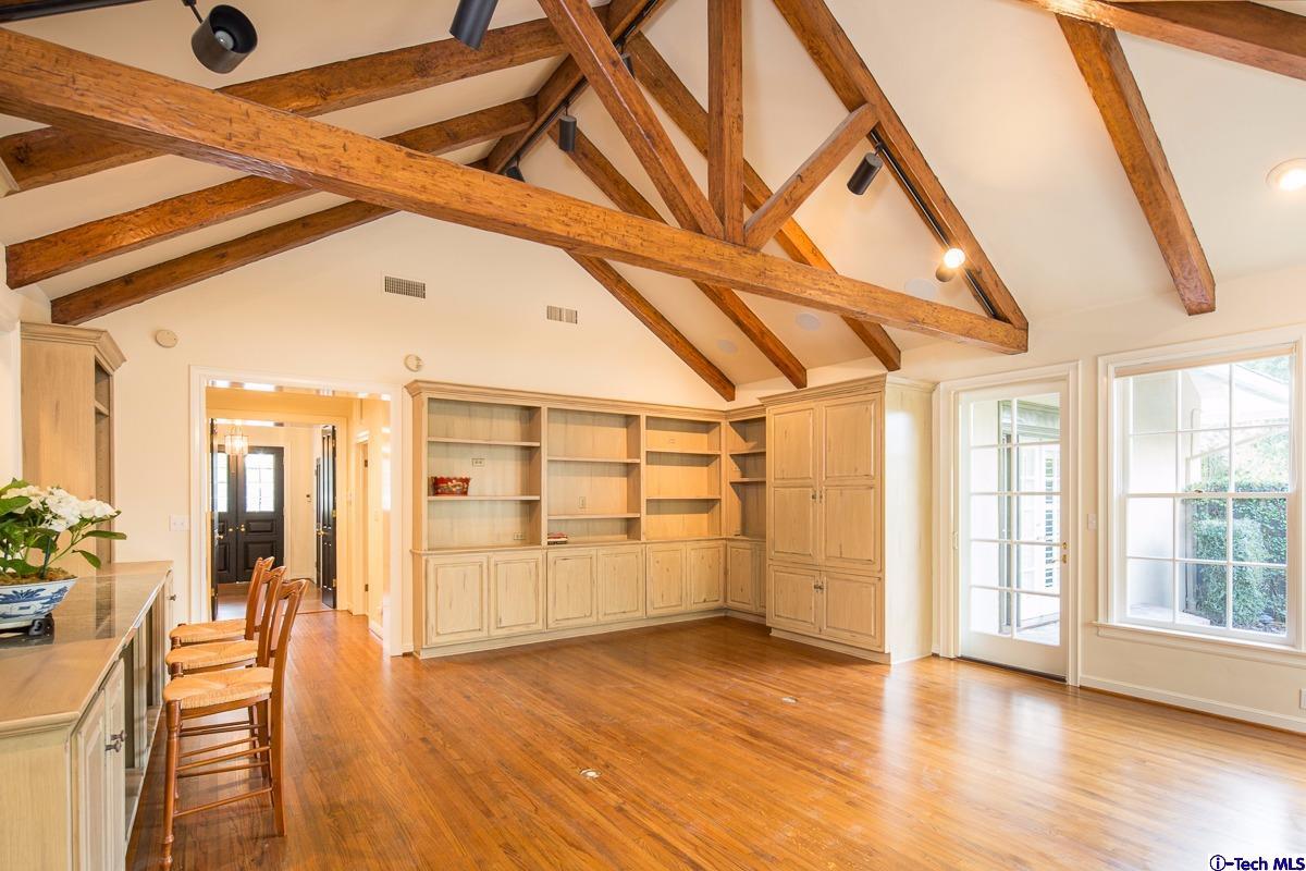 1 Oak Knoll Terrace Pasadena, CA 91106 - Photo 55 of 88 a view of an empty room with wooden floor and windows