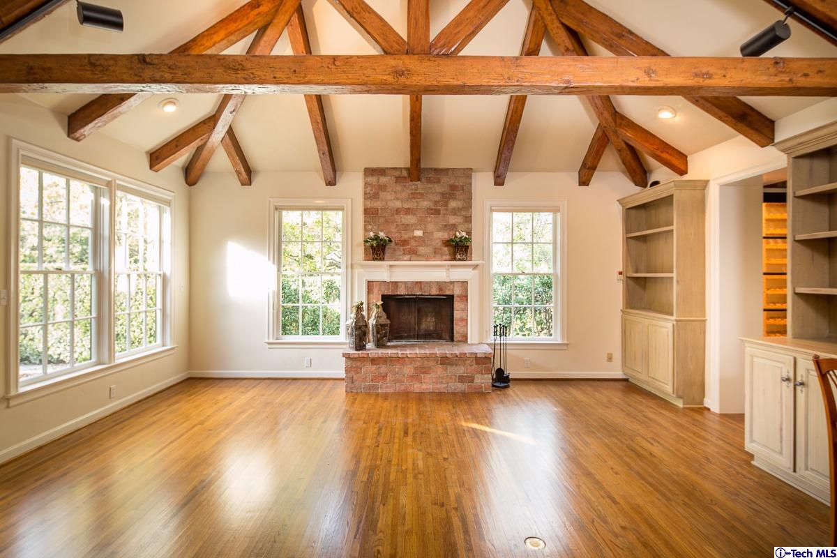 1 Oak Knoll Terrace Pasadena, CA 91106 - Photo 56 of 88 a view of an empty room with a window and wooden floor