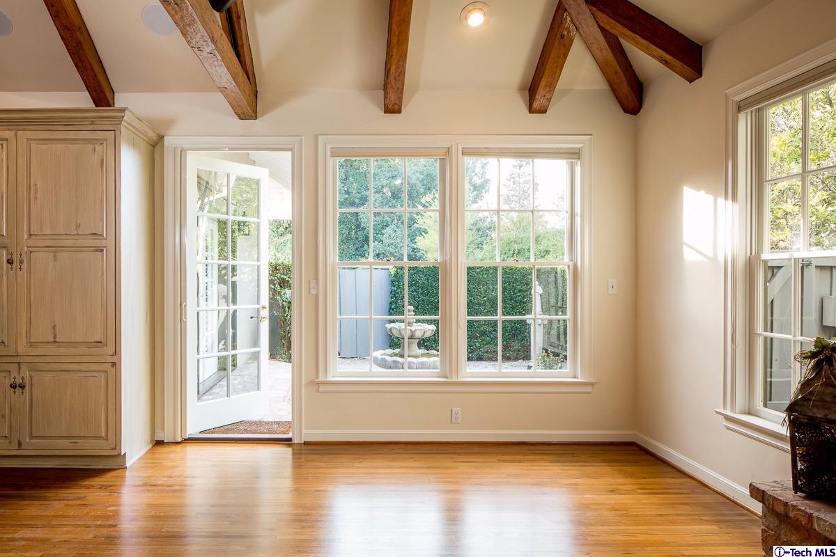 1 Oak Knoll Terrace Pasadena, CA 91106 - Photo 58 of 88 a view of an empty room with wooden floor and a window
