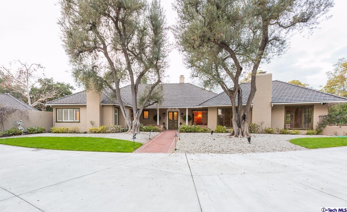 1 Oak Knoll Terrace Pasadena, CA 91106 - Photo 73 of 88 a front view of a house with a yard and garage