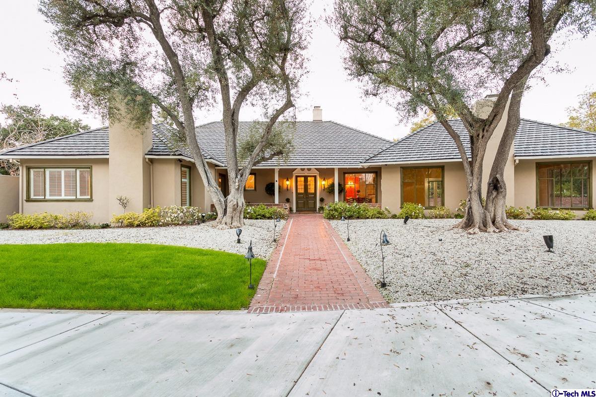 1 Oak Knoll Terrace Pasadena, CA 91106 - Photo 74 of 88 a front view of a house with a yard and trees