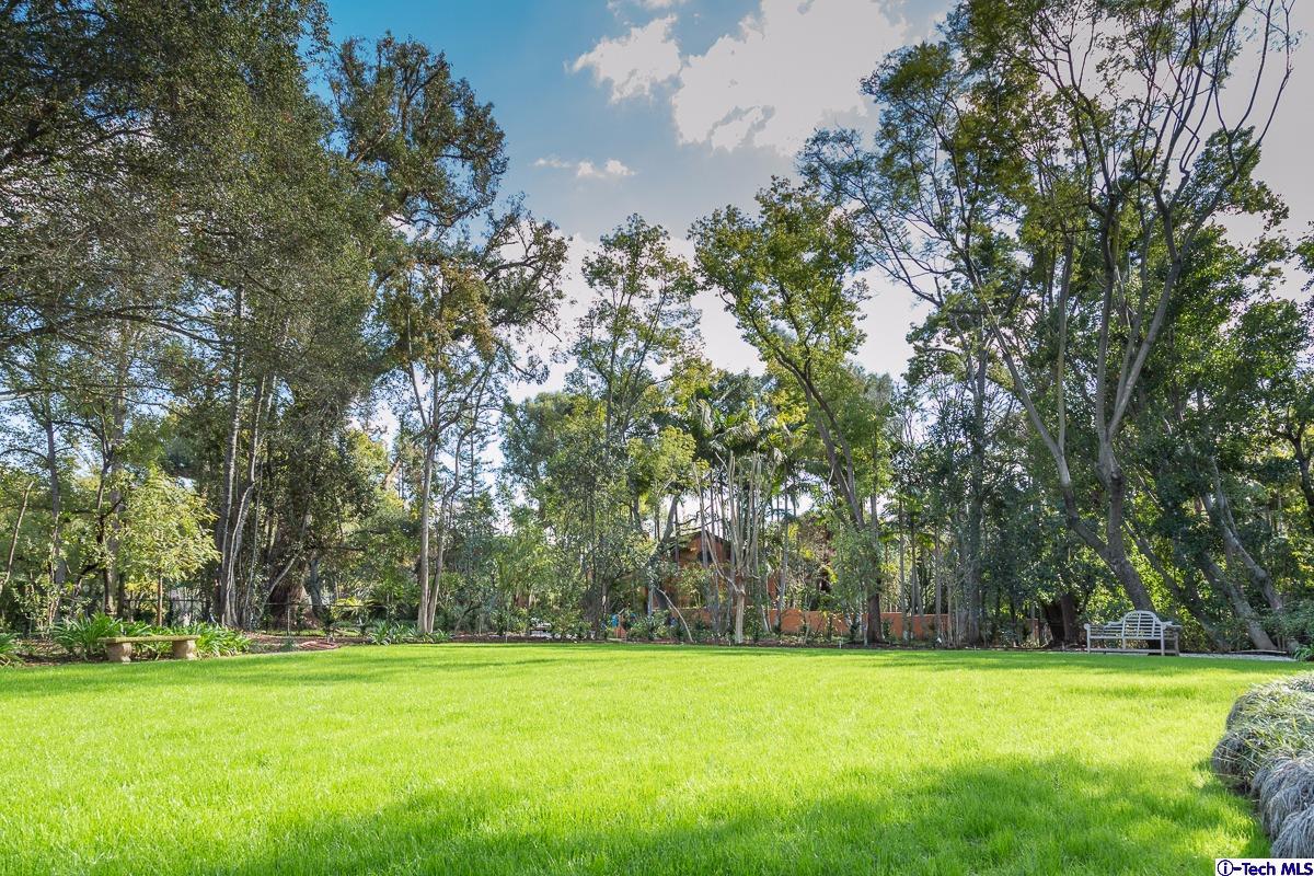 1 Oak Knoll Terrace Pasadena, CA 91106 - Photo 9 of 88 a view of a grassy field with trees in the background