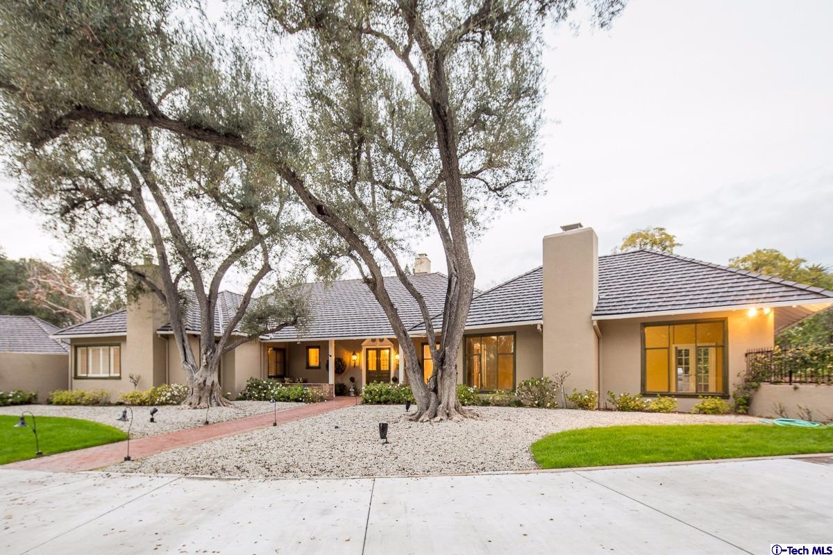 1 Oak Knoll Terrace Pasadena, CA 91106 - Photo 82 of 88 a front view of a house with a yard and garage