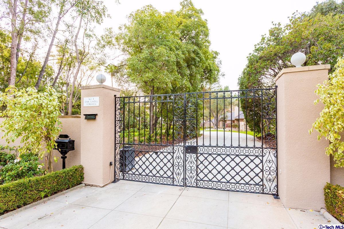 1 Oak Knoll Terrace Pasadena, CA 91106 - Photo 88 of 88 a side of a house with a large window and wooden fence