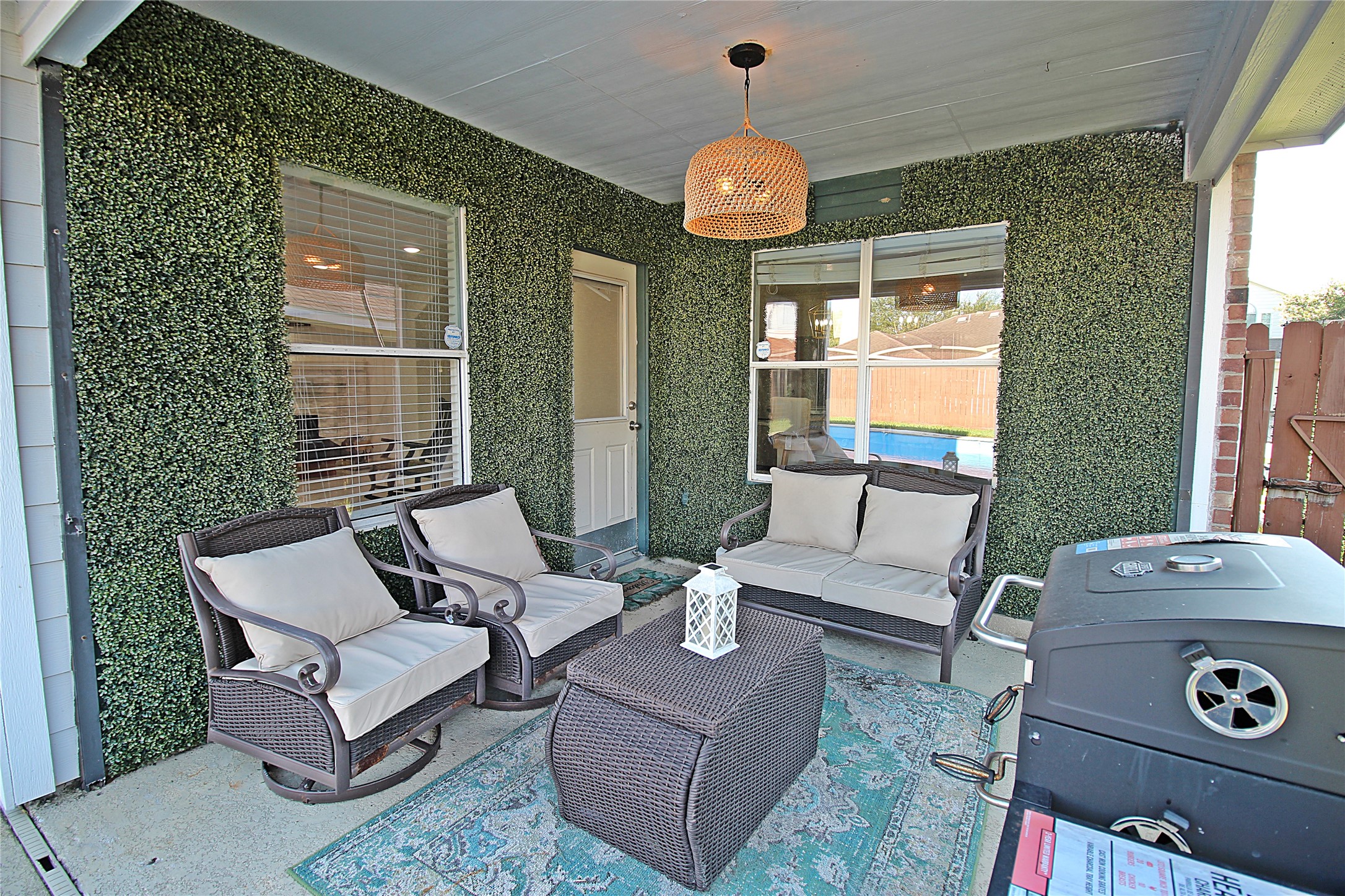 8314 Silver Fir Lane Baytown, TX 77523 - Photo 19 of 22 a living room with furniture and a large window