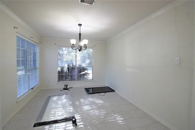 a view of a room with windows